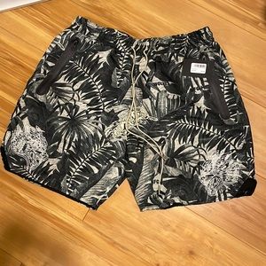 Darc sports shorts. Zip pockets. Mesh inner lining